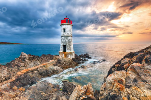 Preview: Dramatic gloomy view of Capo Ferro Lighthouse.
