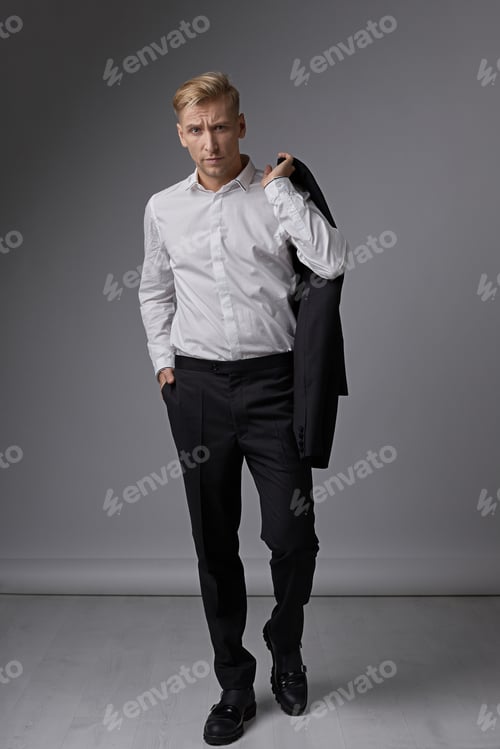 Preview: Casual businessman portrait demonstrating facial expression
