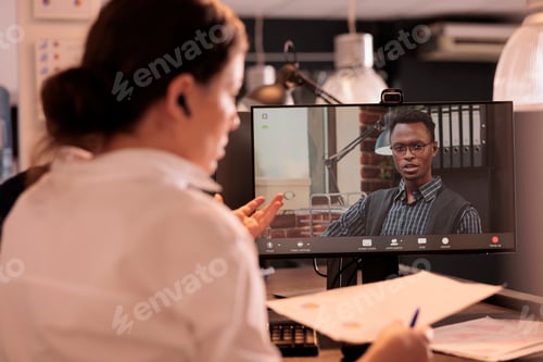 Preview: Online meeting, employees discussing company report on corporate videocall
