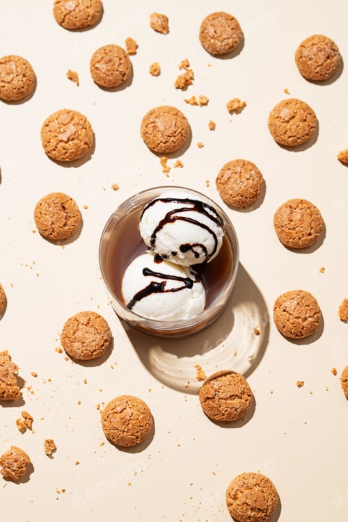 Preview: Concept pattern of affogato coffee with vanilla ice cream scoops and espresso in a glass
