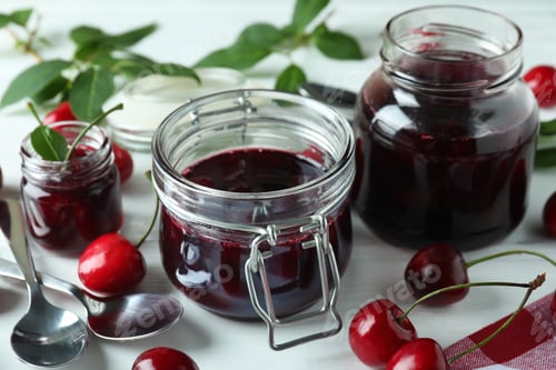 Preview: Cherry jam and ingredients on white wooden table