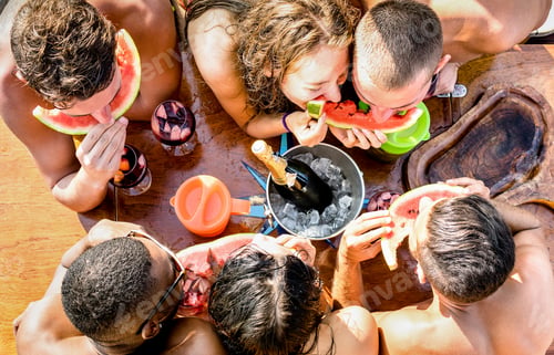 Preview: Top view of multiracial friend having fun at sail boat party
