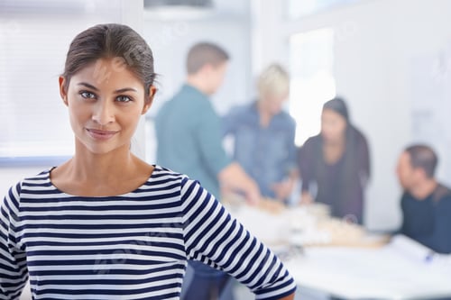 Preview: Portrait of a beautiful young student standing outside an office