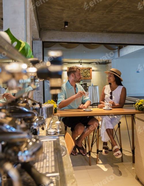 Preview: coffee cafe inside , couple men and women drinking coffee in a cafe