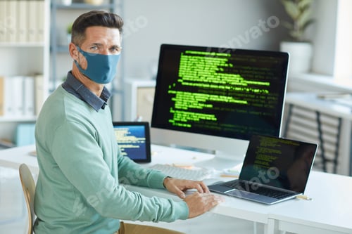 Preview: Man working on computer in IT office