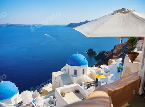 Preview: Oia village, Santorini Island, Greece. View of traditional houses and church in Santorini.