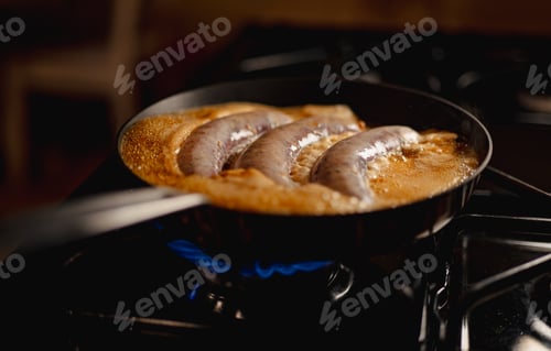 Preview: a skillet with some meatballs in it on the stove