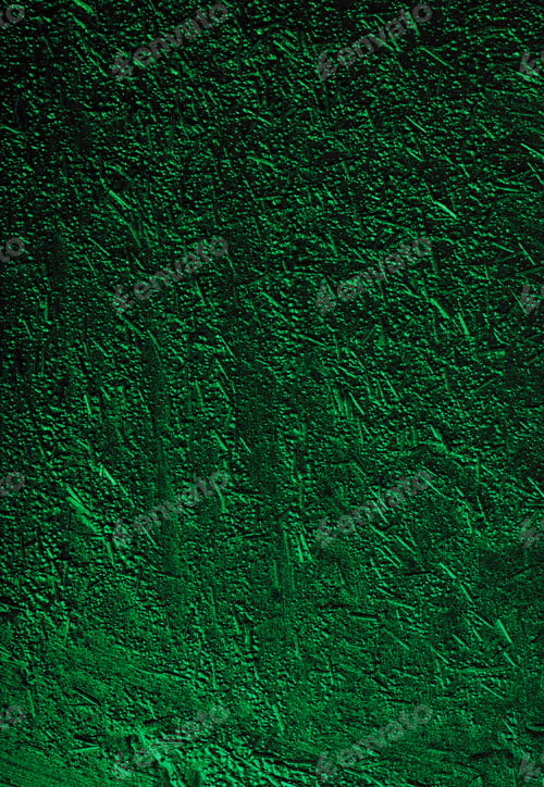 Preview: Green metallic textured background.Vertical photography.Unusual texture of the nail polish.
