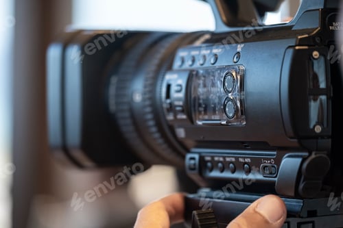 Preview: Close-up of professional video camera in use