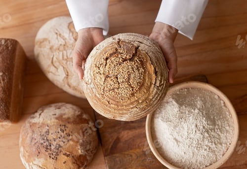 Preview: Crop baker showing loaf of bread