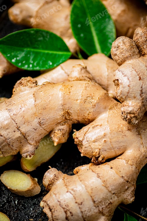 Preview: Pieces of fragrant ginger with leaves.
