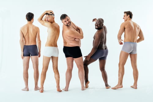 Preview: Group of multiethnic men posing for a male edition body positive beauty set