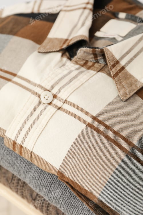 Preview: Folded clothes, close up and selective focus