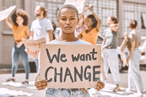 Preview: Black woman, protest group and sign about peace, justice and gender equality in SA for political le