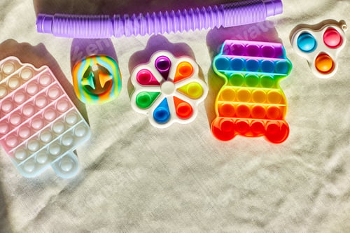 Preview: Top view of trend colorful push pop it bubble sensory fidget toys of different shapes
