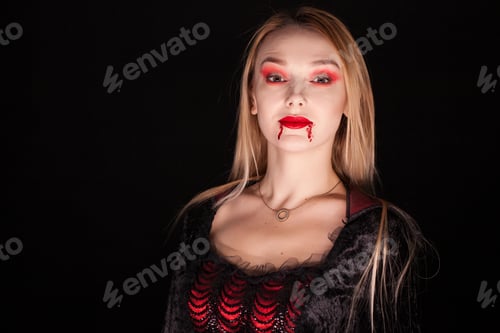 Preview: Beautiful vampire woman with dripping blood
