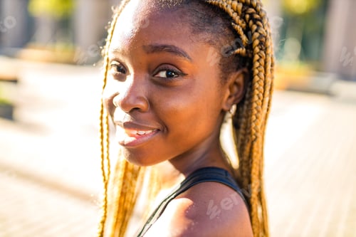 Preview: latin hispanic girl with long yellow dreadlocks pigtails working out outdoor