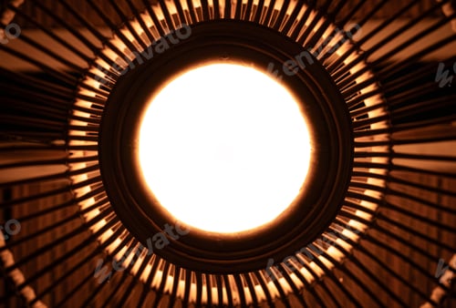 Preview: Abstract light bulb with circular metal pattern