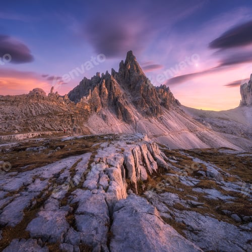 Preview: Alpine mountains at colorful sunset in autumn in Dolomites, Italy