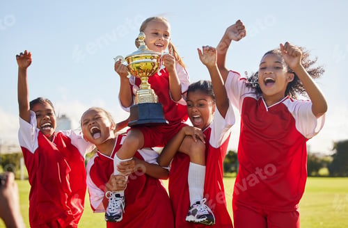 Preview: Football, team and trophy with children in celebration together as a girl winner group for a sports