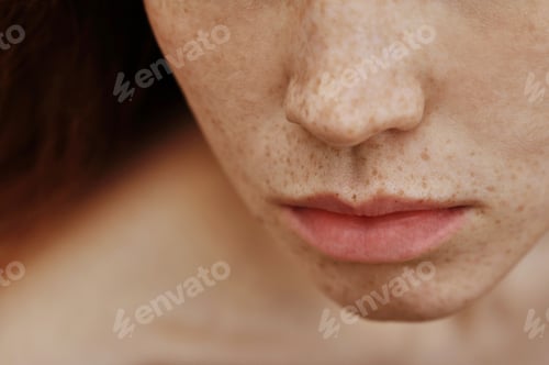 Preview: Young woman with freckles face