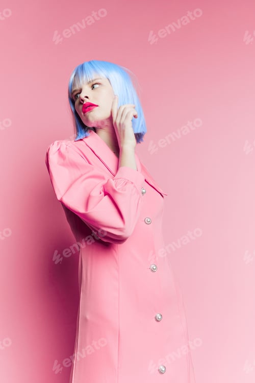 Preview: glamorous woman in blue wig pink dress red lips Lifestyle posing