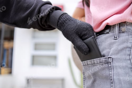 Preview: Close Up Of Gloved Hand Stealing Wallet From Someone's Back Pocket