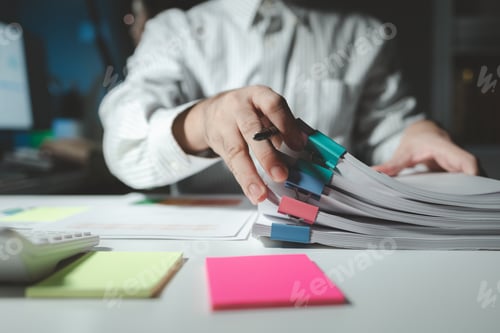 Preview: Auditor is working on accounting in the office, Businessman calculating the financial liquidity of t