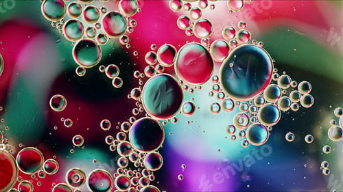 Preview: Abstract Colorful Food Oil Drops Bubbles and spheres Flowing on Water Surface
