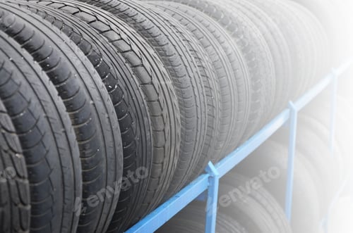 Preview: Rack with variety of car tires in automobile store