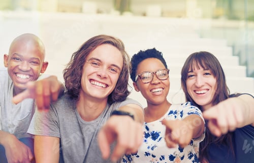 Preview: We need you. Portrait of a group of people pointing their fingers forward together.
