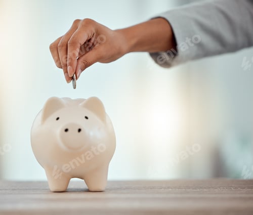Preview: Savings, investment or hand putting a coin into a piggy bank to save for future growth and financia