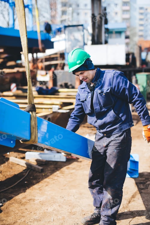 Preview: Manual worker working at shipyard construction site