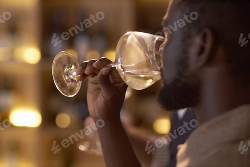 Preview: Unrecognizable Man Drinking White Wine