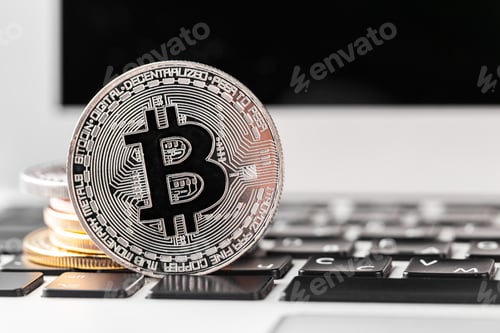 Preview: Bitcoin on laptop keyboard