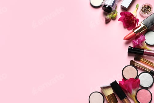 Preview: Frame made of different makeup products and flowers on color background. Space for text