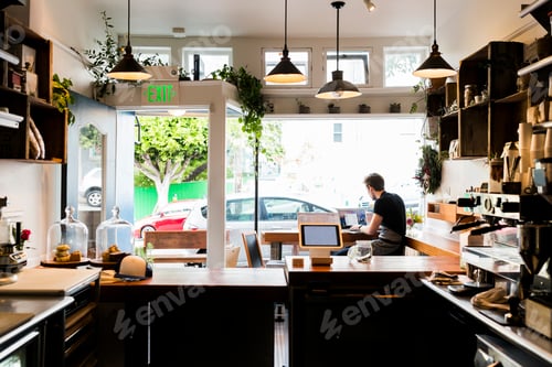 Preview: Man working in coffee shop
