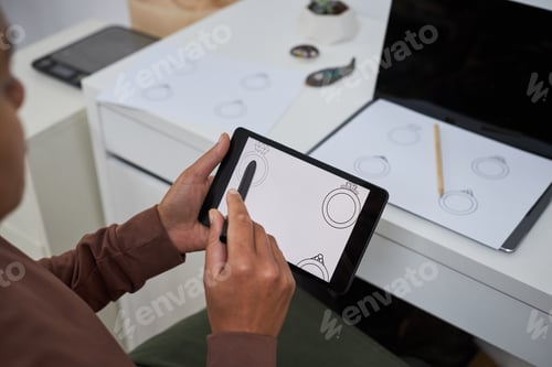 Preview: Close up of female artist using pen tablet