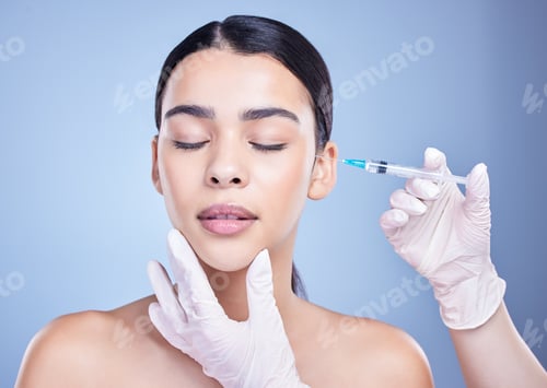 Preview: A gorgeous mixed race woman getting botox filler in her face. Hispanic model getting cosmetic surge