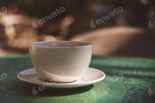 Preview: Coffee mug on mint green table outdoor background - soft light effect style pictures