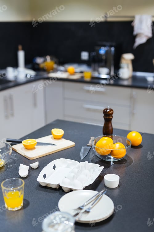 Orange Juice, Eggs and Oranges on Kitchen Counter