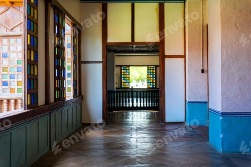 Preview: Lazi Convent featuring multiple glass windows and light brown flooring in Siquijor, Philippines