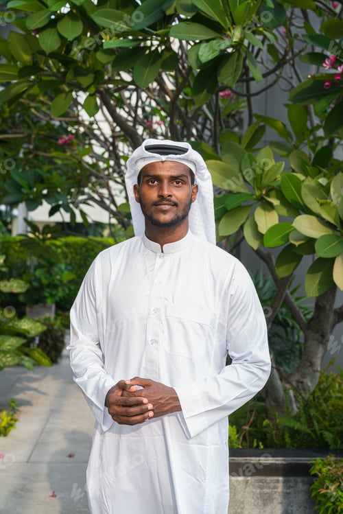 Preview: Portrait of African Muslim man wearing religious clothing an scarf at rooftop garden