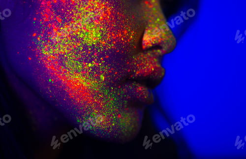 Preview: Fashion model with fluo painting on the face