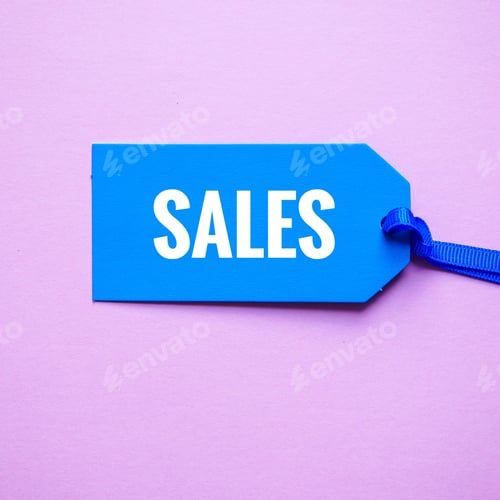 Preview: Blue sale tag hanging on a blue ribbon against a pink background with copyspace