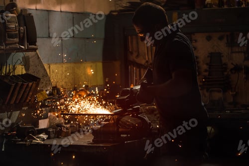 Preview: worker using an angle grinder