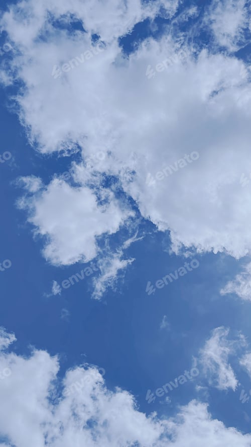 Preview: Cloudy blue sky abstract background, blue sky background with tiny clouds.