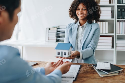 Preview: Female African american Real estate company to buy houses and land are delivering keys and houses