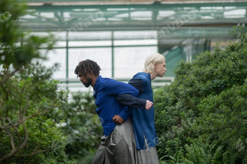 Preview: Bearded African American male model standing near his colleague