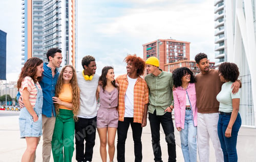 Preview: Happy playful multiethnic group of young friends bonding outdoors